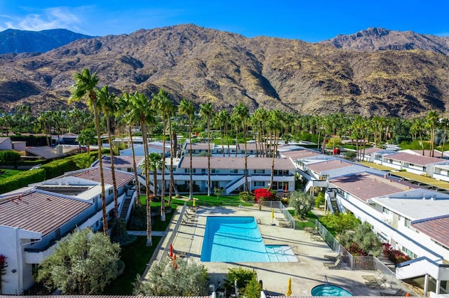 view of swimming pool featuring a mountain view