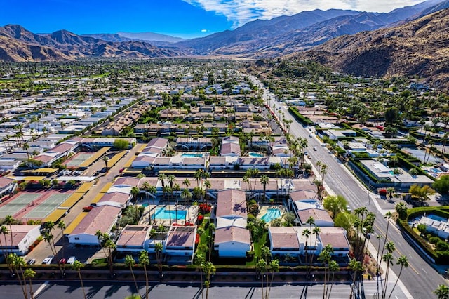 birds eye view of property featuring a mountain view