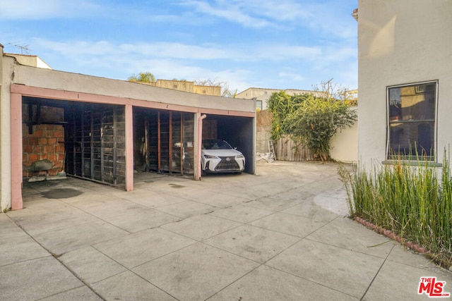 view of patio with a carport