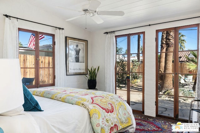 bedroom with access to outside, ceiling fan, and french doors