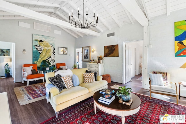 living room featuring dark hardwood / wood-style flooring, beam ceiling, and a chandelier