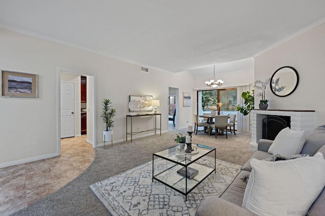 carpeted living room with a fireplace, a notable chandelier, and crown molding