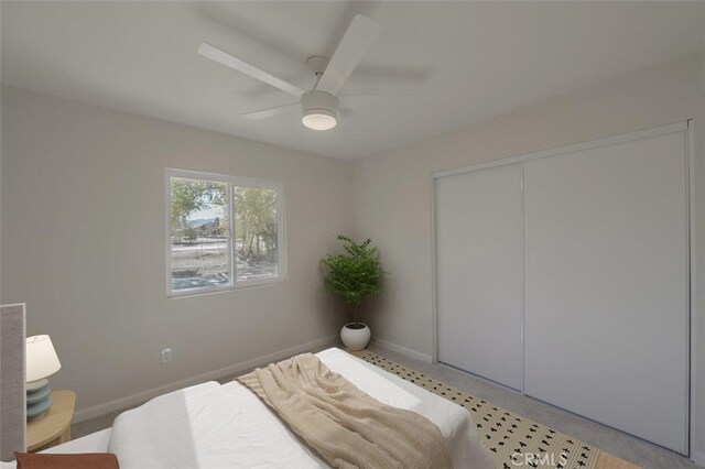 bedroom featuring a closet and ceiling fan