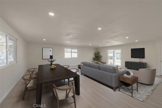 living room with light hardwood / wood-style floors