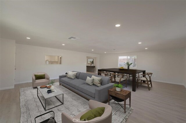 living room featuring light wood-type flooring