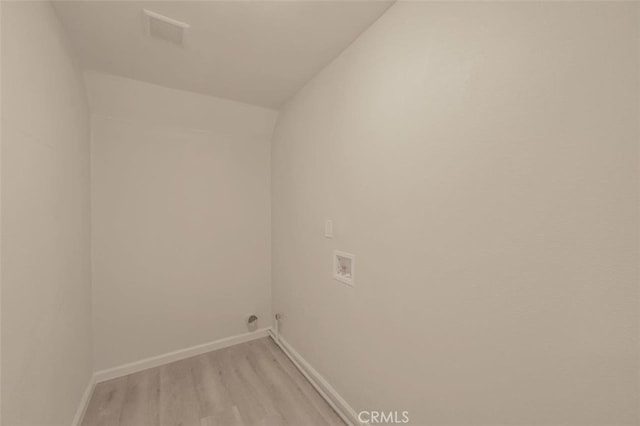 laundry area featuring light hardwood / wood-style flooring and hookup for a washing machine