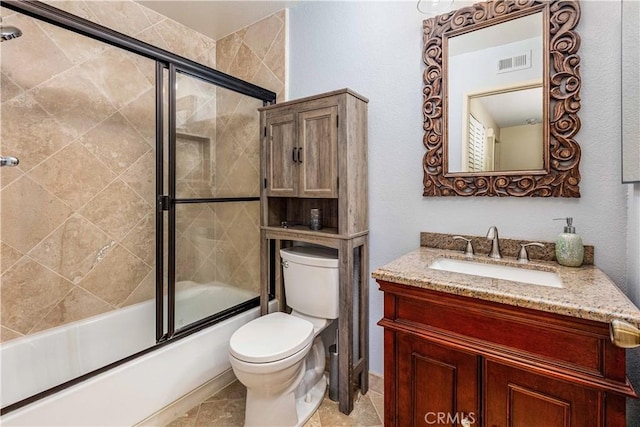 full bath with tile patterned flooring, toilet, shower / bath combination with glass door, vanity, and visible vents