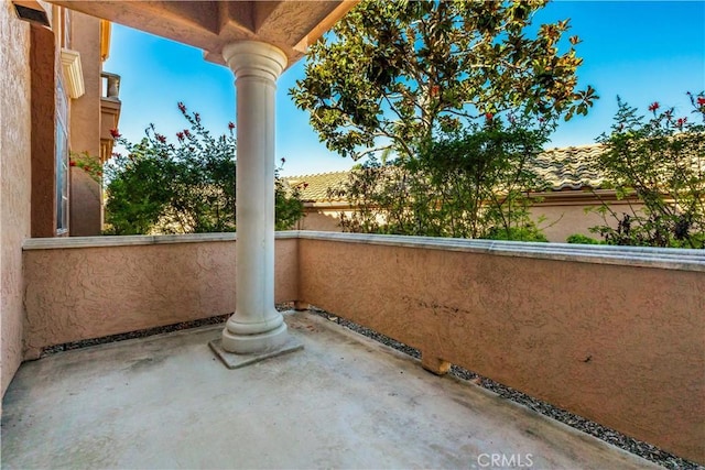 view of patio with a balcony