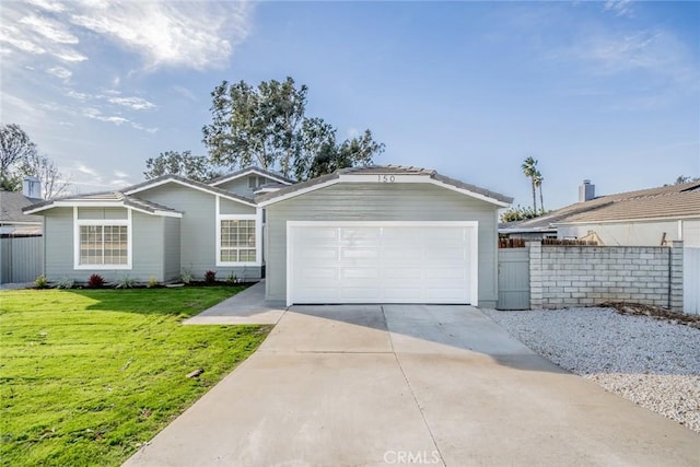 ranch-style house with a garage and a front lawn