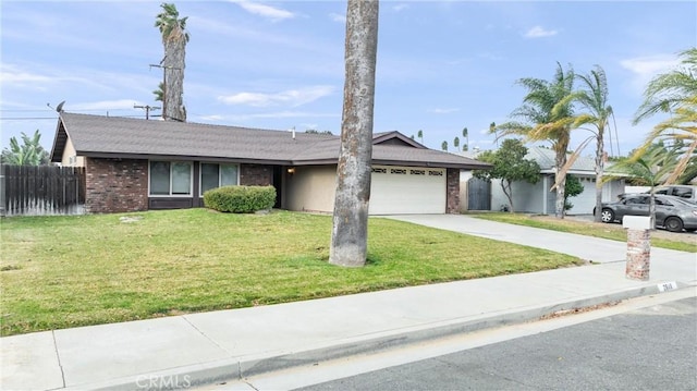 ranch-style home with a front lawn and a garage