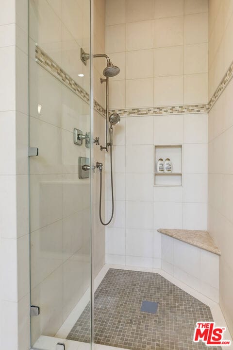 bathroom featuring walk in shower