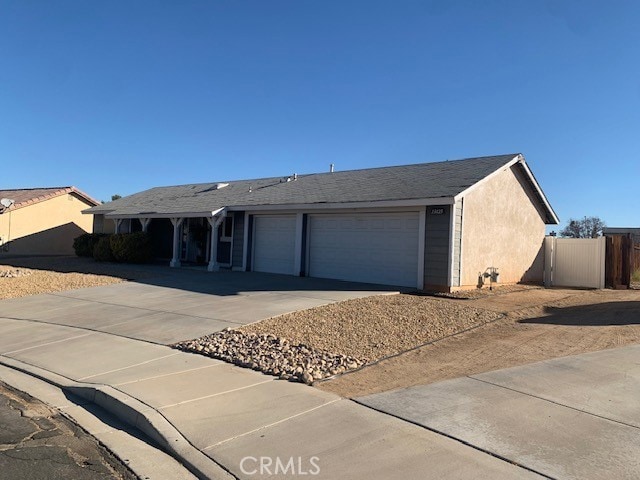 ranch-style home with a garage