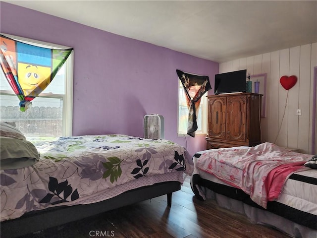 bedroom with wood-type flooring