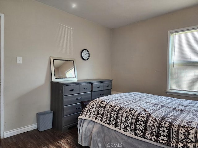 bedroom featuring dark wood-type flooring