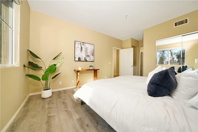 bedroom featuring hardwood / wood-style floors