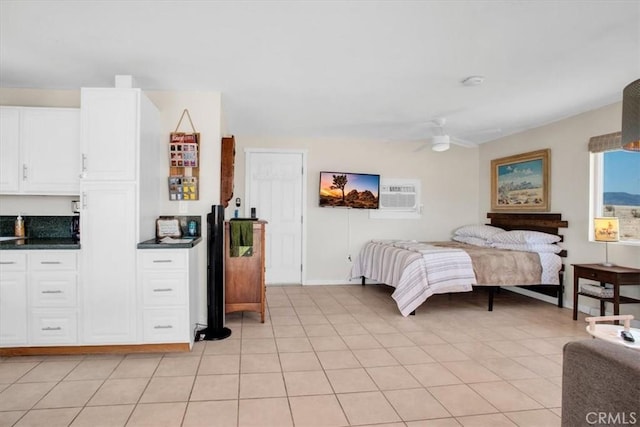 bedroom featuring ceiling fan, light tile patterned floors, and a wall mounted AC