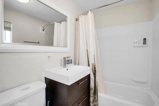 full bathroom featuring toilet, vanity, and shower / tub combo with curtain