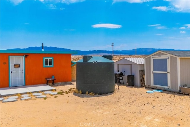 view of outdoor structure featuring a mountain view