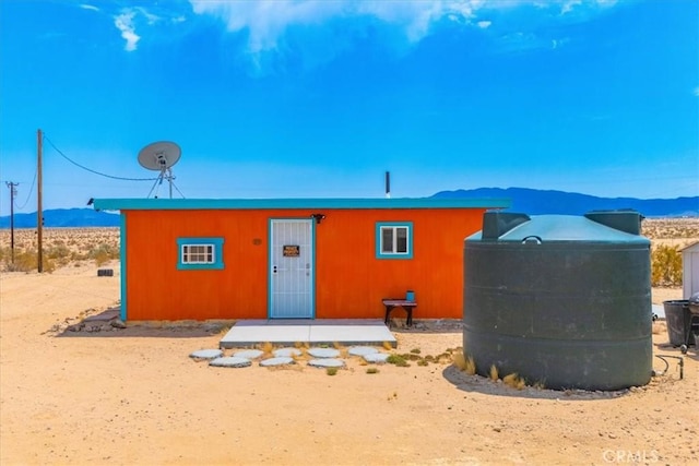 view of outdoor structure featuring a mountain view