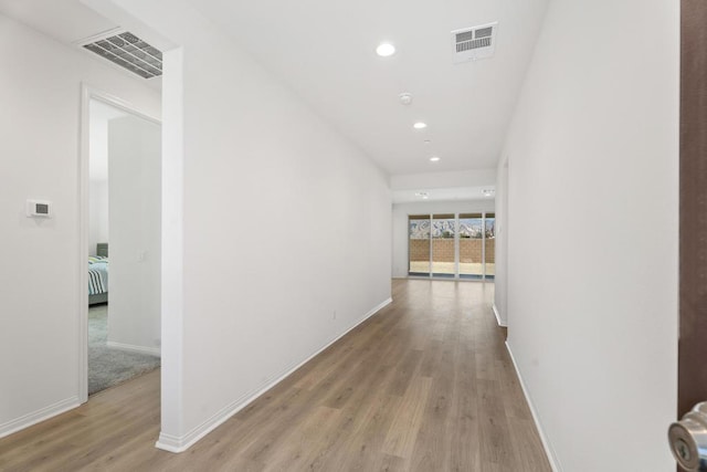 hallway featuring light wood-type flooring