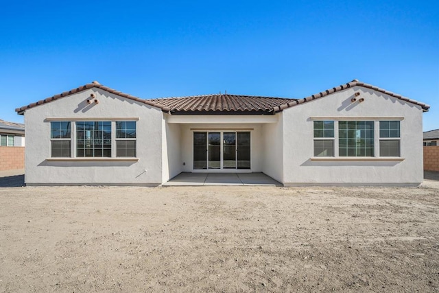 rear view of property with a patio area