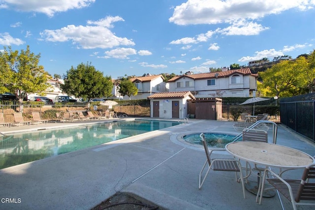 view of pool with a patio area