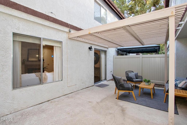 view of patio featuring a pergola