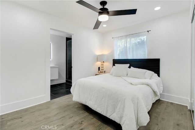 bedroom featuring ceiling fan and wood-type flooring