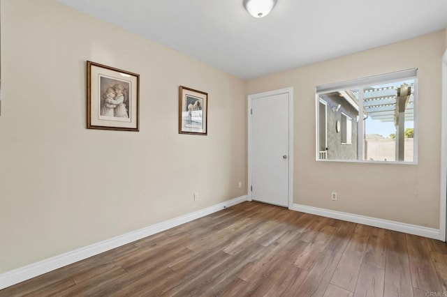 empty room with light wood-type flooring