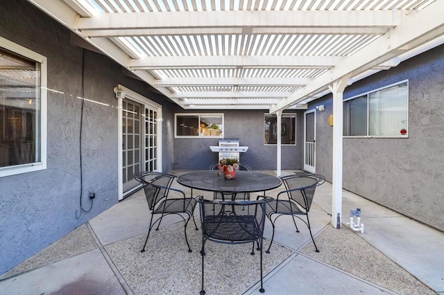 view of patio / terrace featuring area for grilling and a pergola