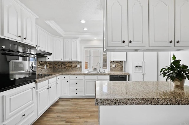 kitchen with sink, white cabinetry, and black appliances