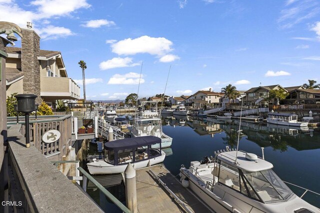 dock area featuring a water view