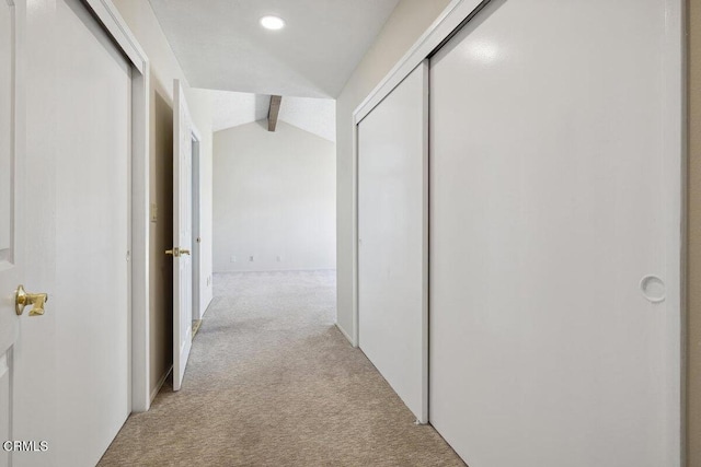 hall with light colored carpet, lofted ceiling with beams, and recessed lighting
