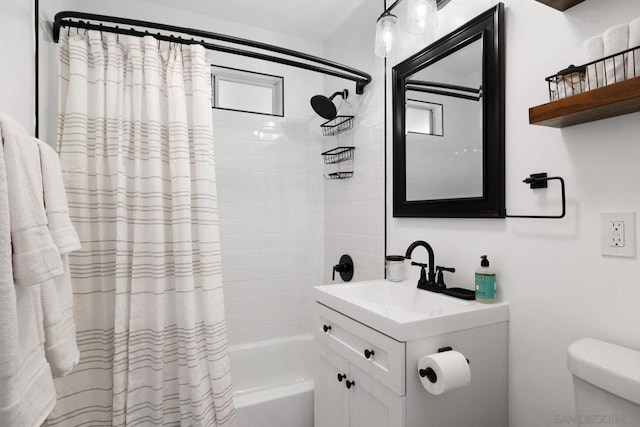 full bathroom featuring toilet, shower / bath combo, and vanity