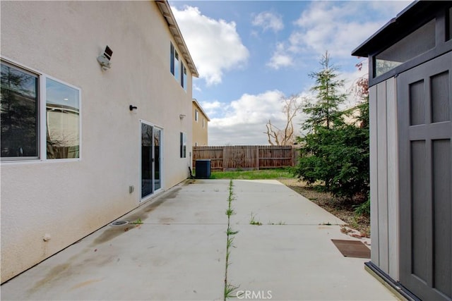 view of patio / terrace featuring fence