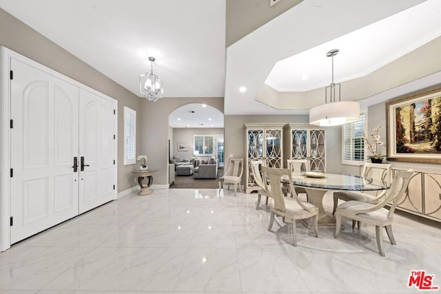 dining room with a chandelier