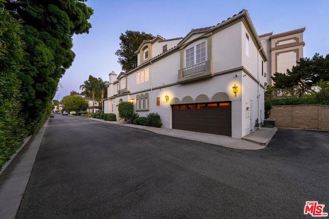 view of front of property with a garage