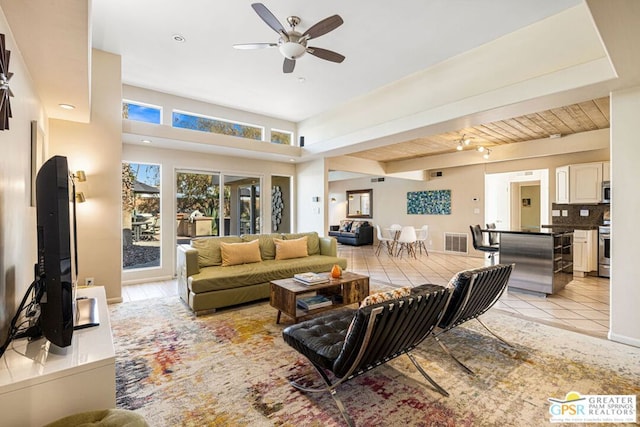 living room with ceiling fan