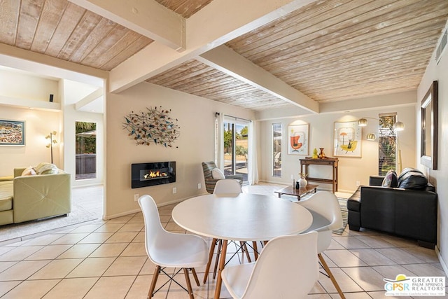 tiled dining room with wooden ceiling and beam ceiling