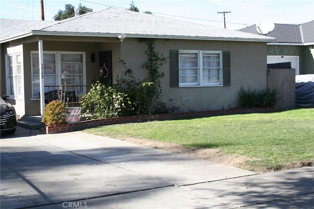 view of front of home with a front yard