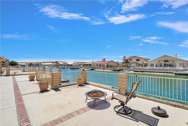 view of patio with a fire pit