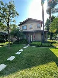 view of front property with a front lawn