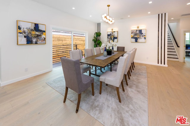 dining space with light wood-type flooring