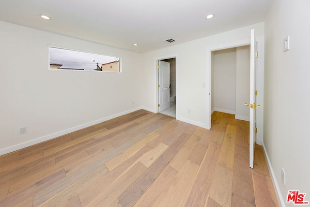 unfurnished bedroom featuring light hardwood / wood-style flooring