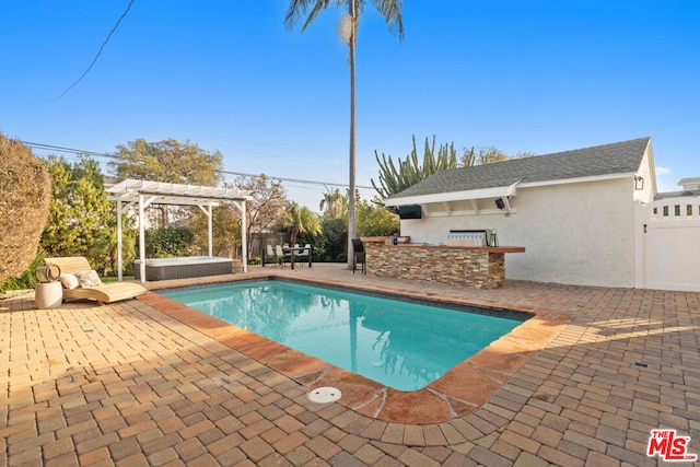 view of pool with a pergola, area for grilling, a hot tub, and a patio