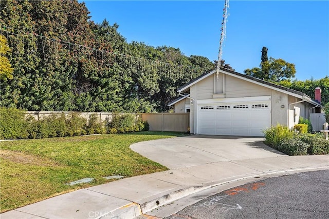 single story home with a garage and a front yard