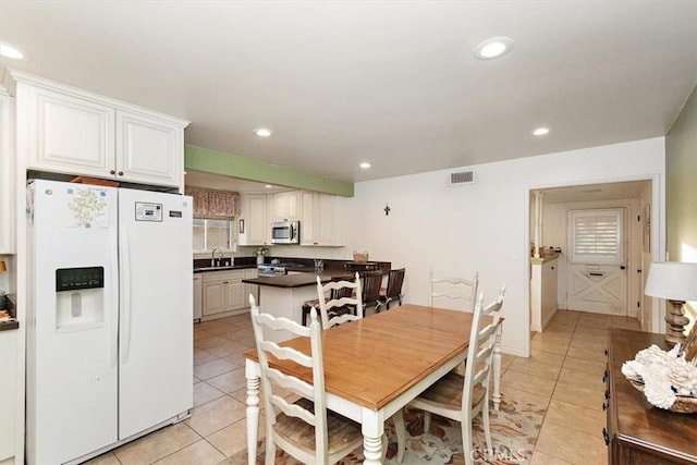 view of tiled dining area