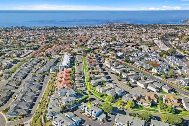 aerial view with a residential view and a water view