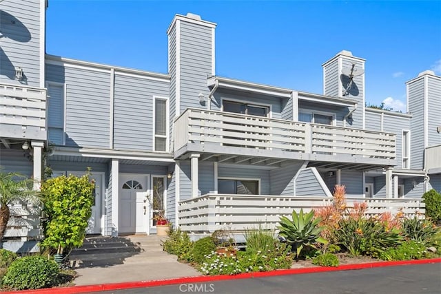 33611 Dana Vista Dr Unit 31, Dana Point, CA 92629 - townhome / multi-family property with a balcony and a chimney