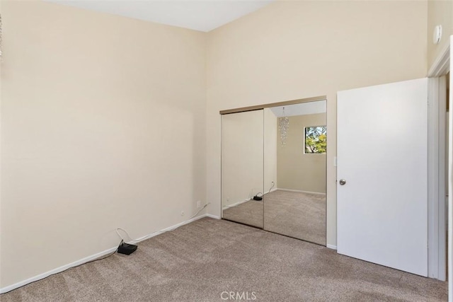 33611 Dana Vista Dr Unit 31, Dana Point, CA 92629 - unfurnished bedroom with carpet floors, a closet, and a high ceiling